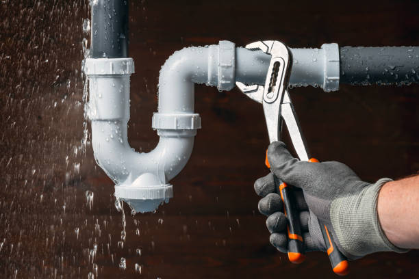 Professional Drain Cleaning technician working in West Newton, MA